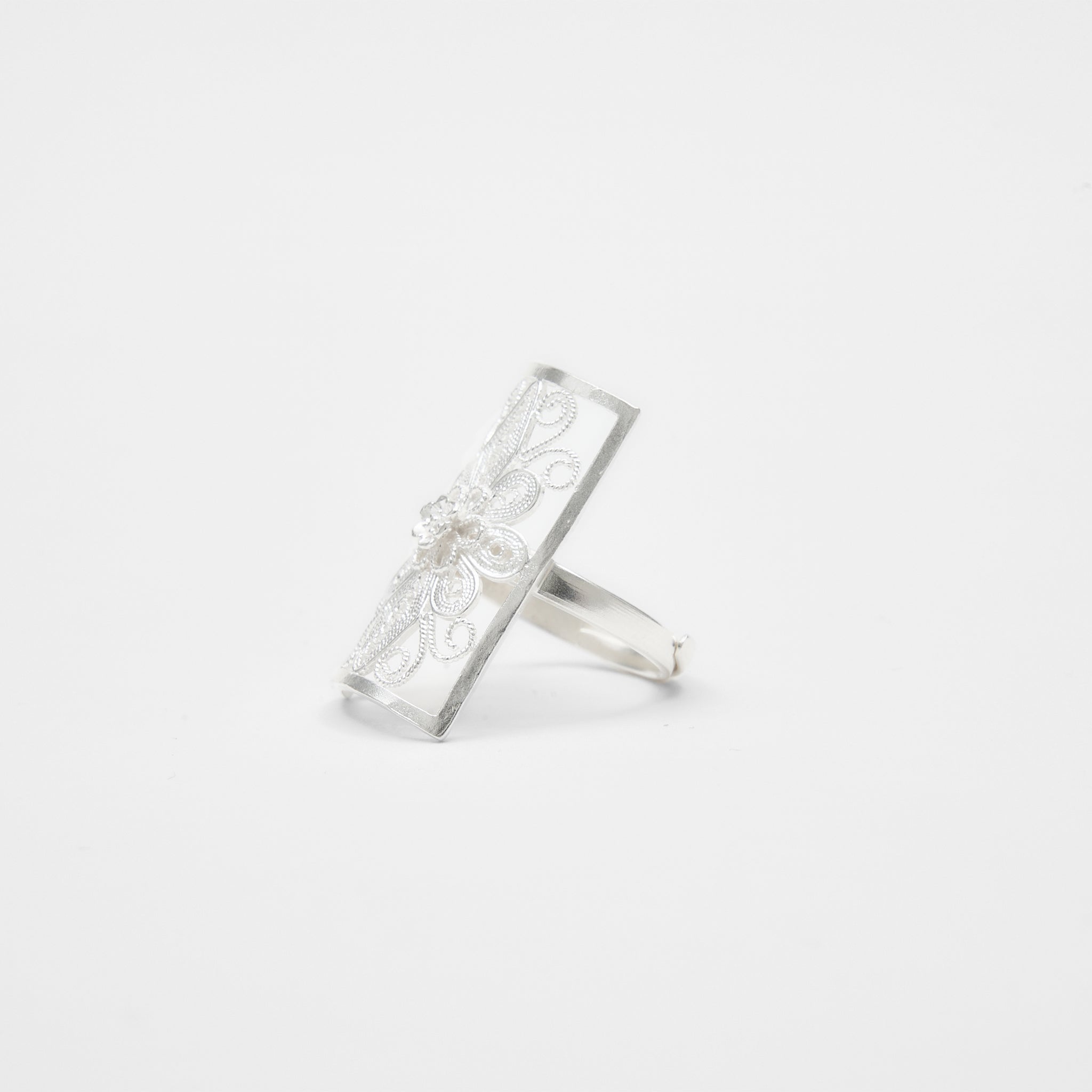 Ebnix Classic Filigree Band Ring with bright silver finish, showcasing artisan floral filigree.